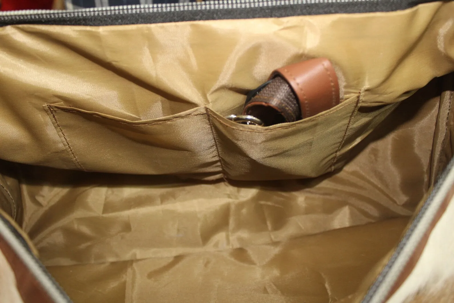 cowhide duffle bag light tan brown white