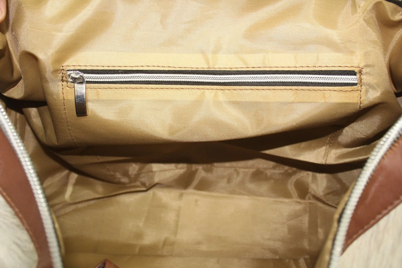 cowhide duffle bag light tan brown white