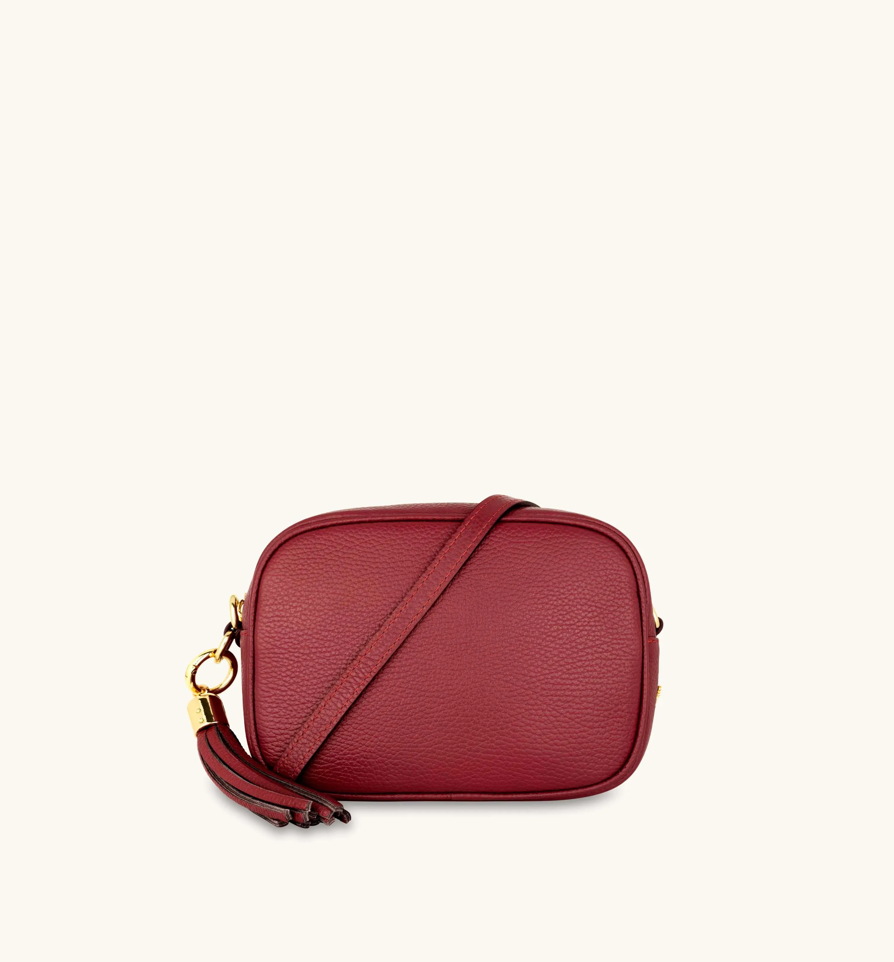 The Tassel Cherry Red Leather Crossbody Bag With Red Cross-Stitch Strap